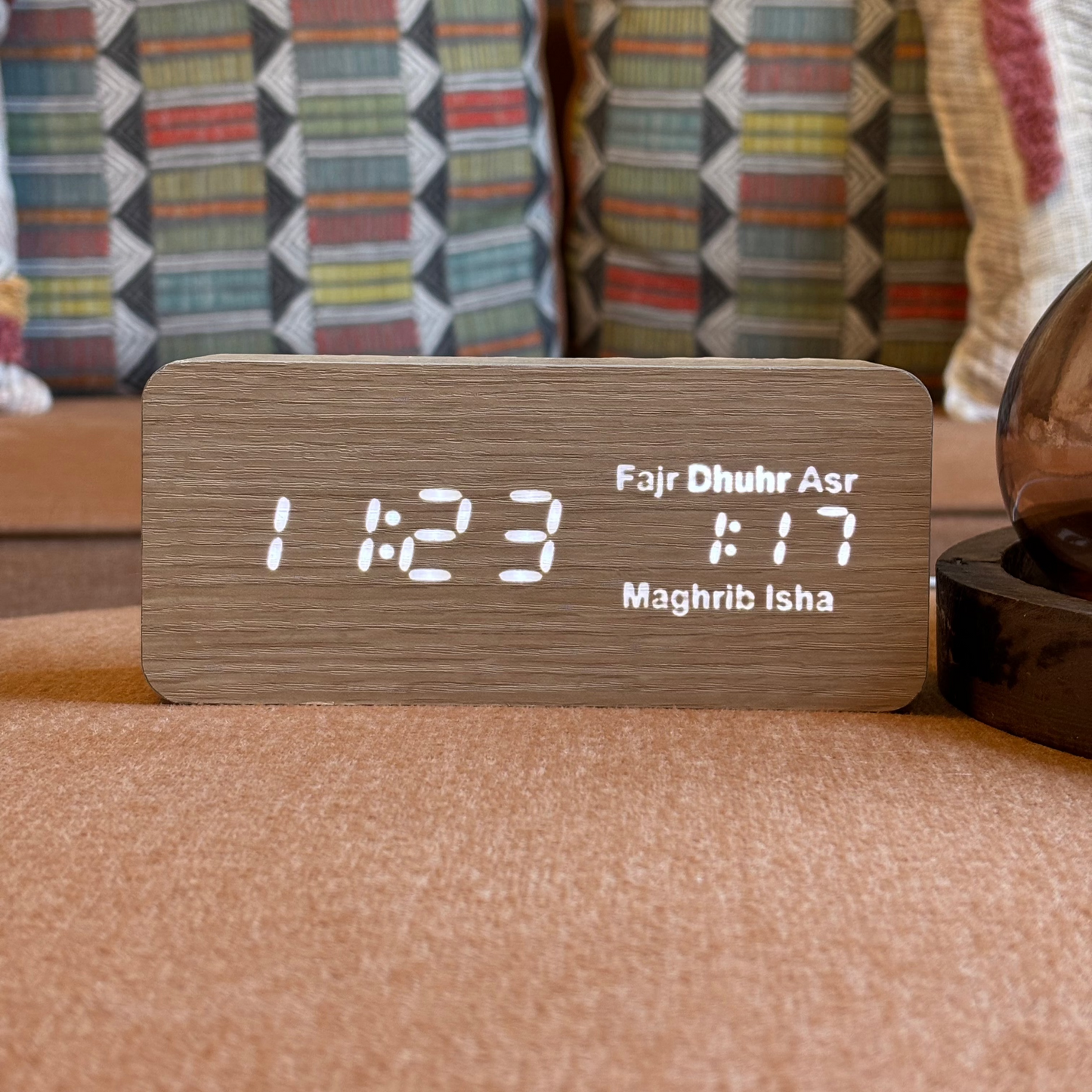 Modern athan clock on ottoman showing Dhuhr as next prayer time at 1:17pm